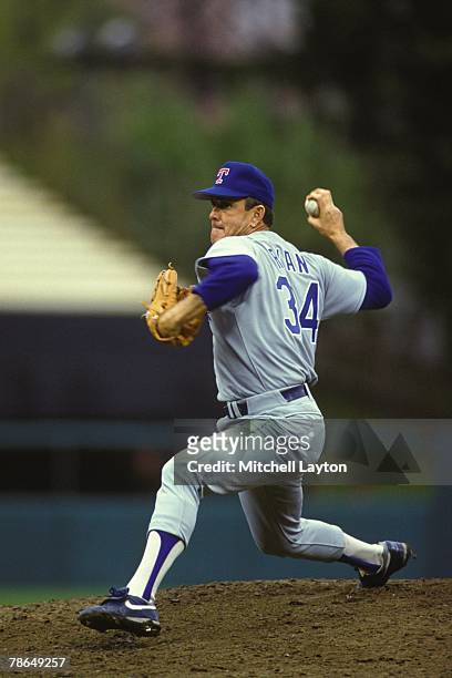 Nolan Ryan of the Texas Rangers pitches during a baseball game against the Baltimore Orioles on June 1, 1991 at Memorial Stadium in Baltimore,...