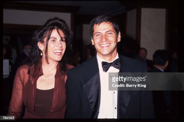 Actor Thomas Calabro stands with his wife Elizabeth Pryor at the Genesis Awards April 5, 1997 in Los Angeles, CA. The Genesis Award is presented by...