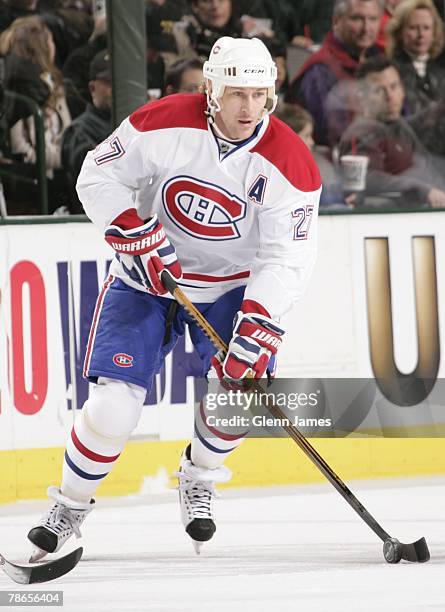 Alexei Kovalev of the Montreal Canadiens handles the puck against the Dallas Stars at the American Airlines Center on December 23, 2007 in Dallas,...