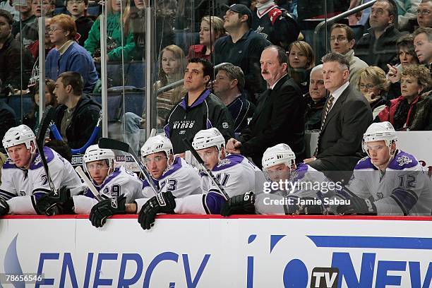 Assistant Coach Dave Lewis, left, and Head Coach Marc Crawford, right, of the Los Angeles Kings watch the game against the Columbus Blue Jackets on...