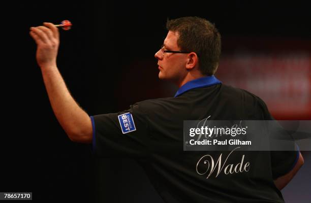 James Wade of England throws a dart during the second round match between James Wade of England and Steve Beaton of England during the 2008...