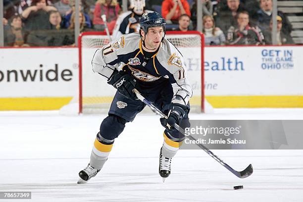 David Legwand of the Nashville Predators skates with the puck against the Columbus Blue Jackets on December 23, 2007 at Nationwide Arena in Columbus,...