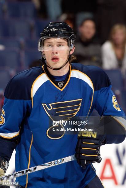 Erik Johnson of the St. Louis Blues skates against the Calgary Flames on December 16, 2007 at Scottrade Center in St. Louis, Missouri.