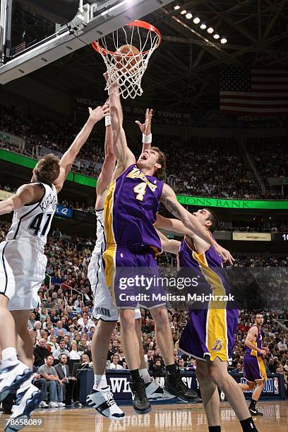 Luke Walton of the Los Angeles Lakers shoots a layup against Andrei Kirilenko of the Utah Jazz during the game at EnergySolutions Arena on November...