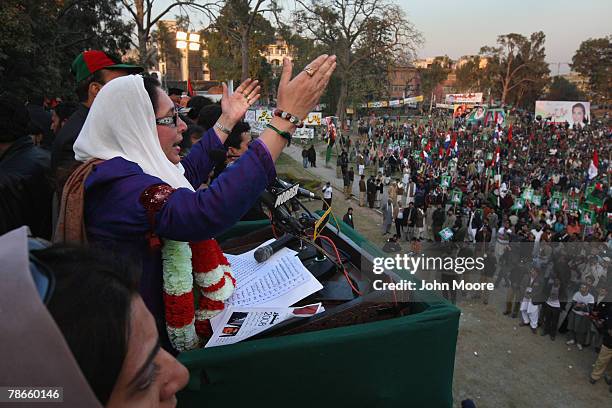 Former Prime Minister Benazir Bhutto speaks at a campaign rally before being assassinated in a bomb attack December 27, 2007 in Rawalpindi, Pakistan....