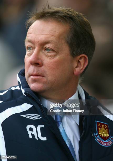 Alan Curbishley, manager of West Ham watches his team during the Barclays Premier League match between West Ham United and Reading held at Upton Park...