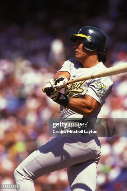 Jose Canseco of the Oakland Athletics bats during a baseball game against the Baltimore Orioles on July 1, 1991 at Memeorial Stadium in Baltimore,...