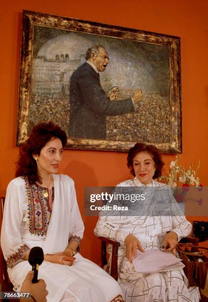 Benazir Bhutto and her mother Nasrat Bhutto during an interview on Benazir's wedding day, December 18 at the Clifton Palace garden in Karachi,...