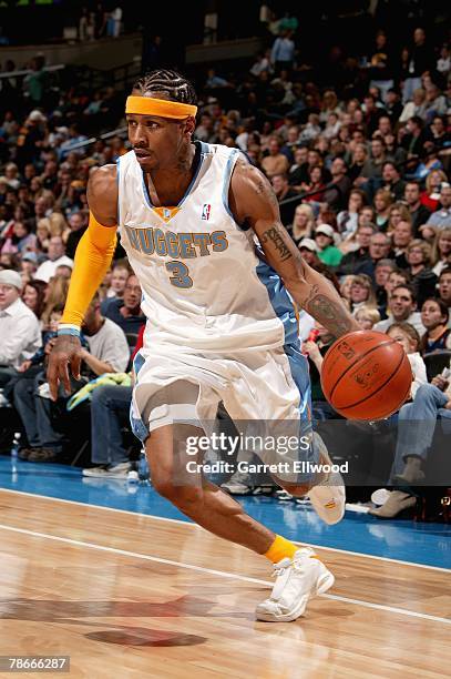 Allen Iverson of the Denver Nuggets drives to the basket during the game against the Sacramento Kings on December 8, 2007 at the Pepsi Center in...