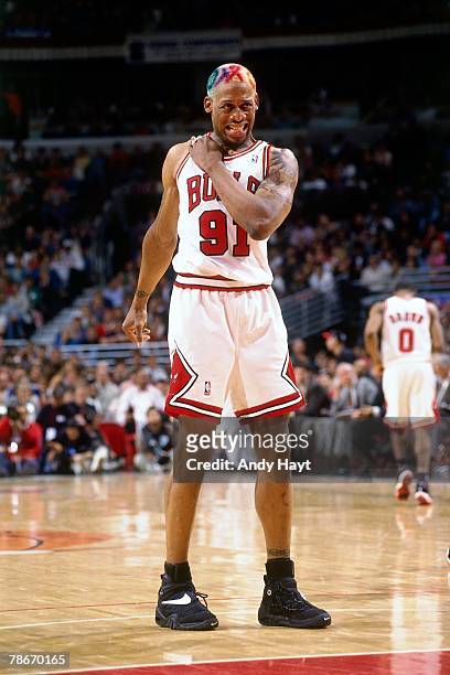 Dennis Rodman of the Chicago Bulls stretches out against the Seattle SuperSonics during Game Two of the 1996 NBA Finals at the United Center on June...