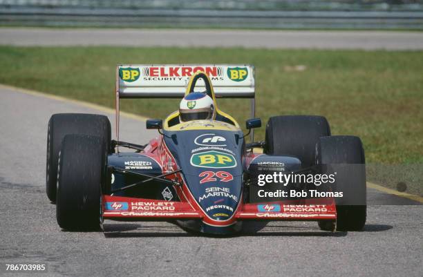 French racing driver Yannick Dalmas drives the Larrousse Calmels Lola LC88 Ford Cosworth DFZ 3.5 V8 in the 1988 Brazilian Grand Prix at the Autodromo...