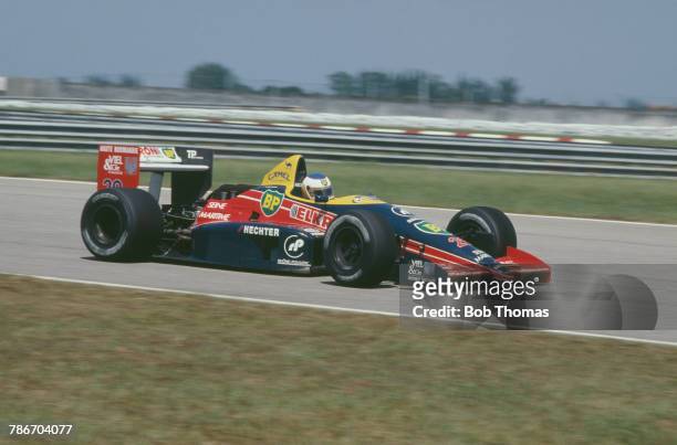 French racing driver Yannick Dalmas drives the Larrousse Calmels Lola LC88 Ford Cosworth DFZ 3.5 V8 in the 1988 Brazilian Grand Prix at the Autodromo...