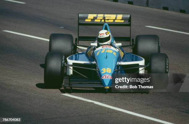 German racing driver Christian Danner drives the Rial Racing Rial ARC2 Ford Cosworth DFR 3.5 V8 in the 1989 United States Grand Prix in Phoenix on...