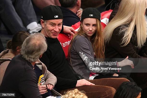 John McEnroe and his daughter Ava attend the Los Angeles Lakers vs Utah Jazz NBA basketball game at the Staples Center on December 28, 2007 in Los...