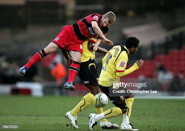 Martin Rowlands of QPR goes for the ball with Damien Francis and Lee Williamson of Watford during the Coca-Cola Championship match between Watford...
