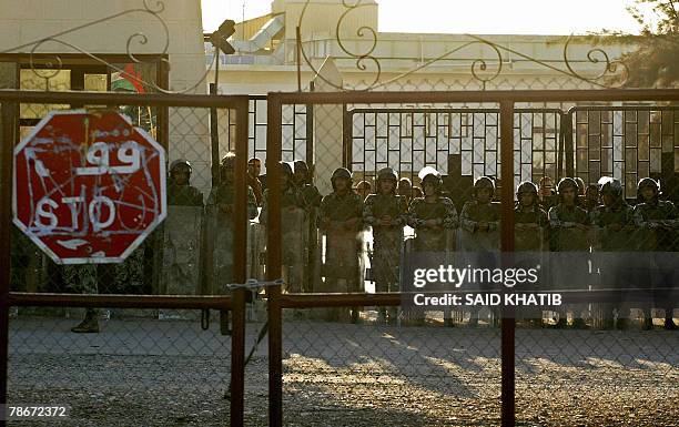 Egyptian riot policemen take position as Palestinians protest in the southern Gaza Strip town of Rafah asking Egypt to open the Rafah border crossing...