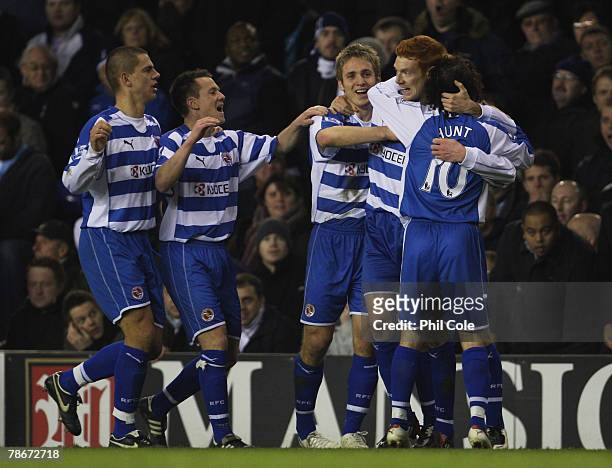 Dave Kitson of Reading is congratulated by teammates after scoring his team's fourth goal during the Barclays Premier League match between Tottenham...