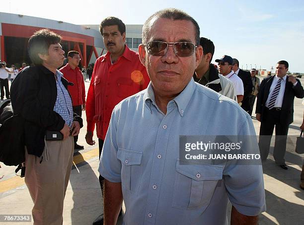 Former Venezuela's Interior Minister Ramon Rodriguez Chacin, waits to board the plane that will take him to Villavicencio, Colombia, at Simon Bolivar...