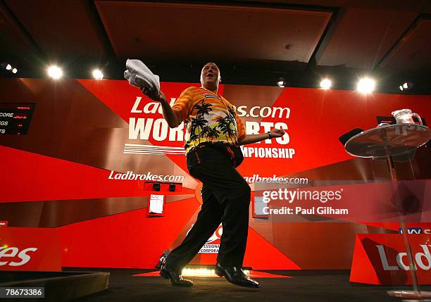 Wayne Mardle of England plays up to the crowd during the quarter final match between Phil Taylor of England and Wayne Mardle of England during the...