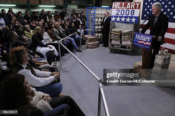 Former U.S. President Bill Clinton speaks at Salmon Falls Stoneware on behalf of his wife and presidential hopeful U.S. Senator Hillary Clinton...