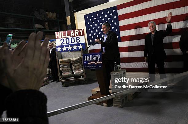 Former U.S. President Bill Clinton prepares to speak at Salmon Falls Stoneware on behalf of his wife and presidential hopeful U.S. Senator Hillary...