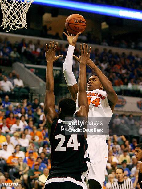 Marreese Speights of the Florida Gators scores over Lavoy Allen of the Temple Owls in the Orange Bowl Basketball Classic at Bank Atlantic Center...