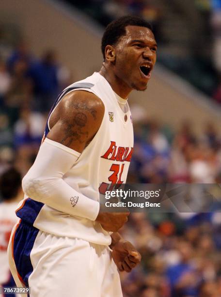 Marreese Speights of the Florida Gators celebrates after getting a dunk against the Temple Owls in the Orange Bowl Basketball Classic at Bank...