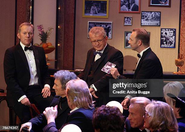 Johannes B. Kerner, Nils Heckscher and Kim Heckscher attend the birthday gala to celebrate Dieter Thomas Heck's 70th birthday on December 29, 2007 in...