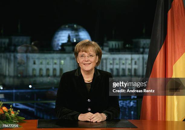 German Chancellor Angela Merkel delivers the new years speech during a telecast at the Chancelerry on December 30, 2007 in Berlin, Germany.