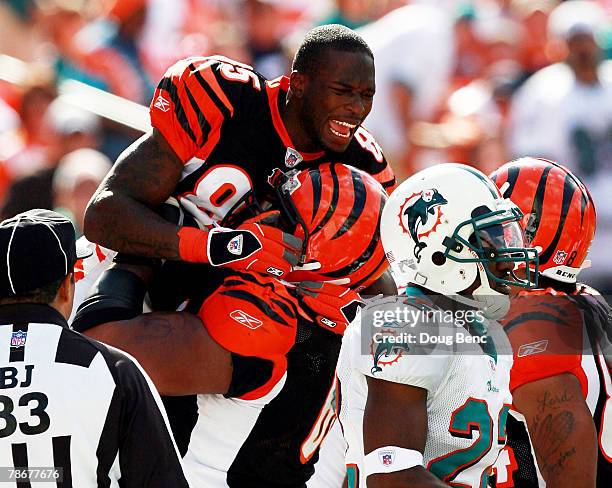 Wide receiver Chad Johnson of the Cincinnati Bengals celebrates his first touchdown of the game against the Miami Dolphins at Dolphin Stadium on...