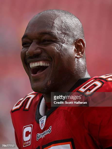 Derrick Brooks of the Tampa Bay Buccaneers walks on the field prior to the start of their game against the Carolina Panthers at Raymond James Stadium...