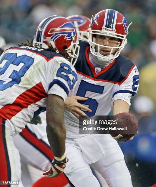 Quarterback Trent Edwards of the Buffalo Bills hands off the ball to to running back Marshawn Lynch during the game against the Philadelphia Eagles...