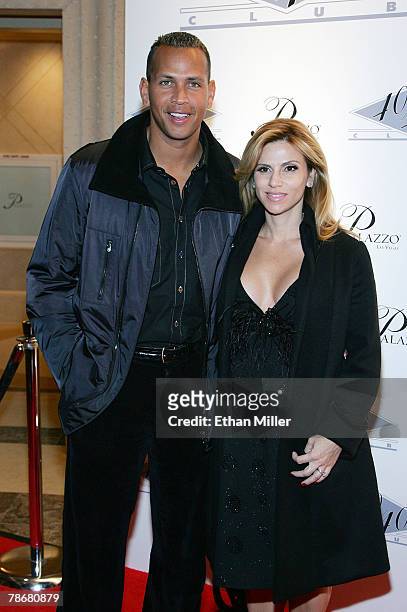 Alex Rodriguez of the New York Yankees and his wife Cynthia Scurtis arrive at the opening of Jay-Z's USD 20 million 40/40 Club, a 24,000-square-foot...