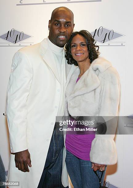 Player Gary Payton and his wife Monique Payton arrive at the opening of Jay-Z's USD 20 million 40/40 Club, a 24,000-square-foot sports bar and lounge...