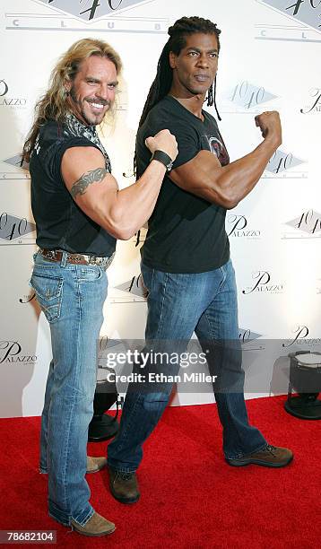 Don "Wolf" Yates and William "Mayhem" Romeo from the television show "American Gladiators" arrive at the opening of Jay-Z's USD 20 million 40/40...