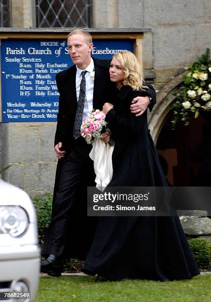 Billie Piper with husband Laurence Fox leave the Parish Church of St. Mary on December 31, 2007 in Easebourne, West Sussex, England.