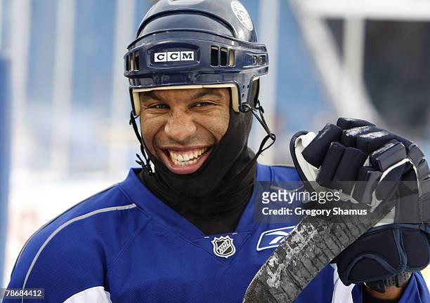 Georges Laraque of the Pittsburgh Penguins laughs during practice for the NHL Winter Classic at Ralph Wilson Stadium December 31, 2007 in Orchard...