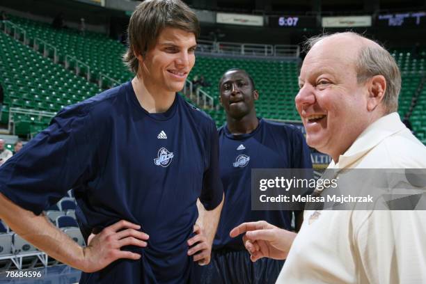 Kyle Korver of the Utah Jazz meets team owner Larry H. Miller prior to a game against the Portland Trail Blazers at EnergySolutions Arena on December...