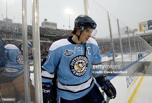 Sidney Crosby of the Pittsburgh Penguins takes the ice for warm ups prior to taking on the Buffalo Sabres in the NHL Winter Classic on January 1,...