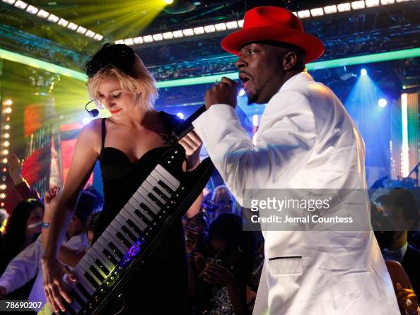 Musicians Niia and Wyclef Jean perform on stage during Tila Tequila's ...