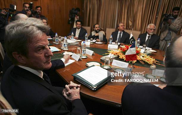 Visiting French Foreign Minister Bernard Kouchner attends a meeting with his Pakistani counterpart Inam-ul-Haq at the foreign ministry in Islamabad,...