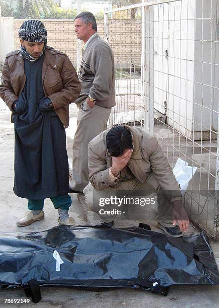 An Iraqi man mourns over the death of a relative killed today in a blast at a hospital morgue in Baquba, 45 kms northeast of Baghdad, 02 January...