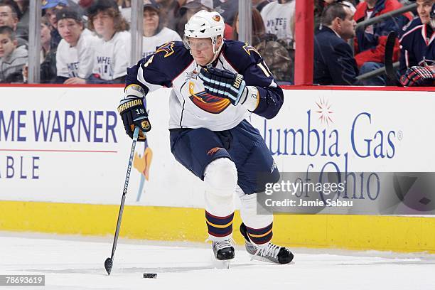 Marian Hossa of the Atlanta Thrashers skates with the puck against the Columbus Blue Jackets on December 26, 2007 at Nationwide Arena in Columbus,...