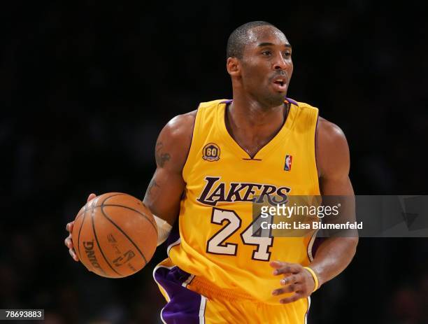 Kobe Bryant of the Los Angeles Lakers drives the ball upcourt during the game against the Utah Jazz at Staples Center on December 28, 2007 in Los...
