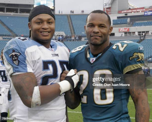 Tennessee RB LenDale White, left, poses with Jacksonville RB Fred Taylor, right, on November 5, 2006 in Jacksonville, Florida. The Jaguars defeated...