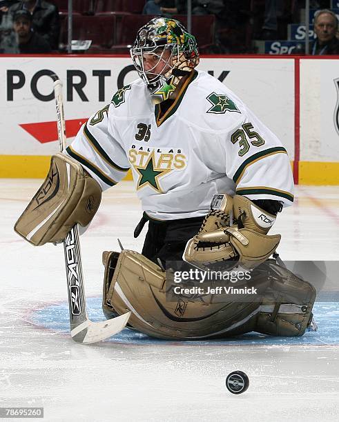 Marty Turco of the Dallas Stars makes a save during their game against the Vancouver Canucks at General Motors Place on December 20, 2007 in...