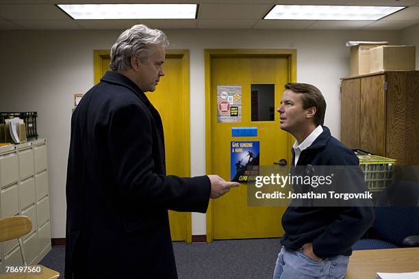 Former Senator John Edwards campaigning i with actor Tim Robbins onDecember 12, 2007 in Des Moines, Iowa.