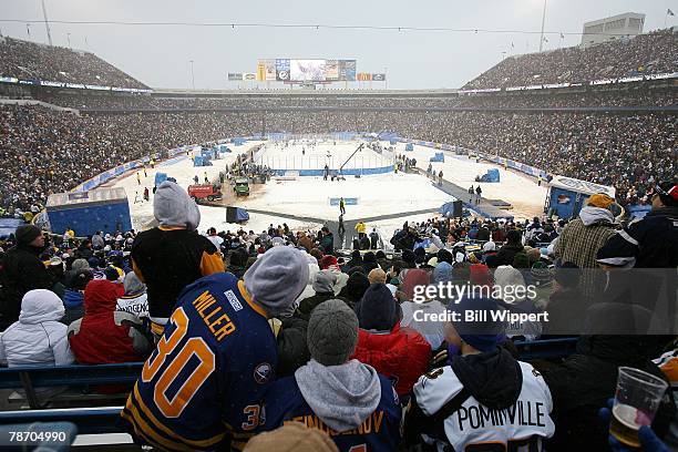 Fans of the Buffalo Sabres watch them play the Pittsburgh Penguins in the NHL Winter Classic on January 1, 2008 at Ralph Wilson Stadium in Orchard...