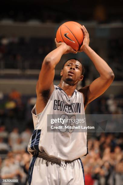 Patrick Ewing Jr. #33 of the Georgetown Hoyas takes a foul shot during a basketball game against the Fordham Rams at Verizon Center on December 31,...