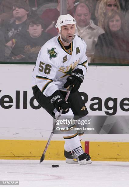 Sergei Zubov of the Dallas Stars looks to make a pass to a teammate against the Nashville Predators at the American Airlines Center on December 31,...